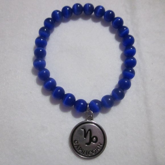 Blue Capricorn Charm Bracelet. - Picture 1 of 3